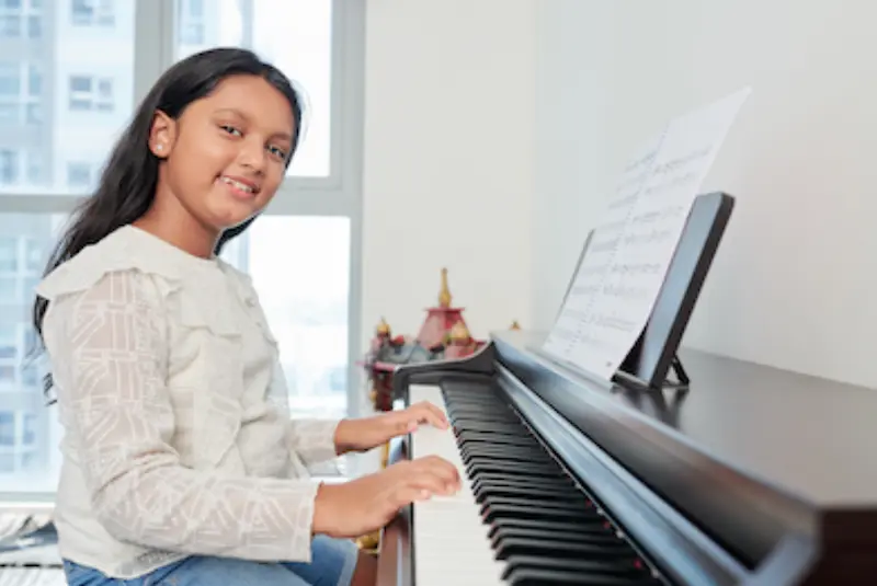 student playing piano lesson