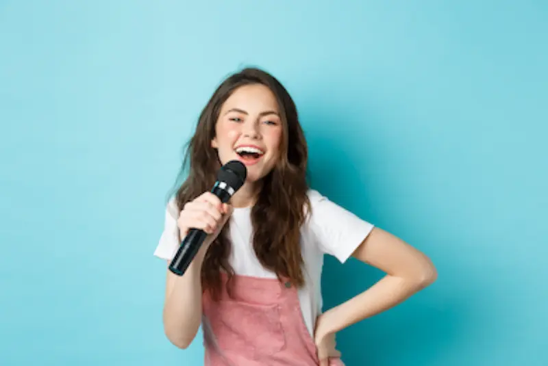 student singing in voice lesson